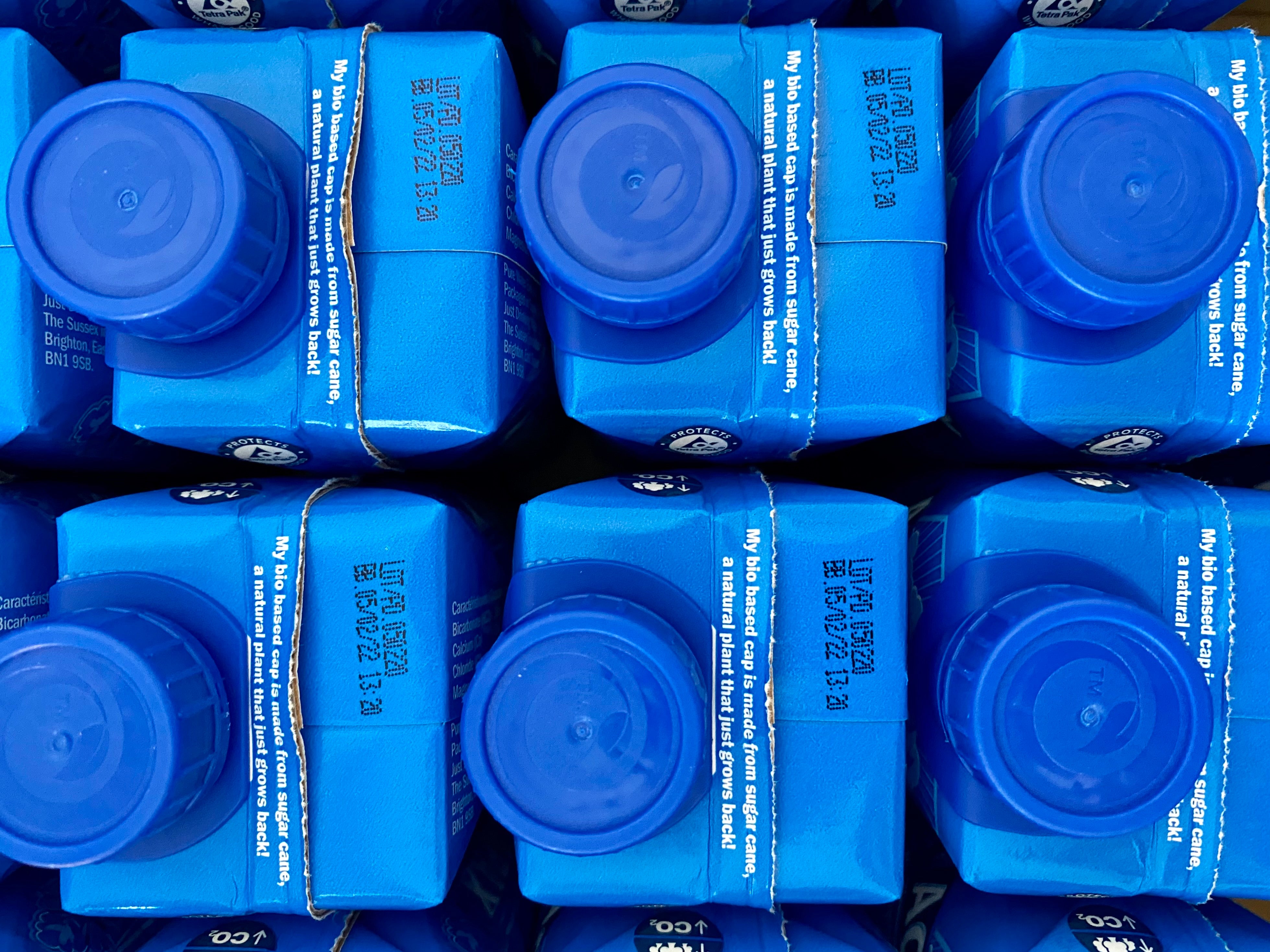 sugar cane caps, water carton, aquapax, spring water, pure